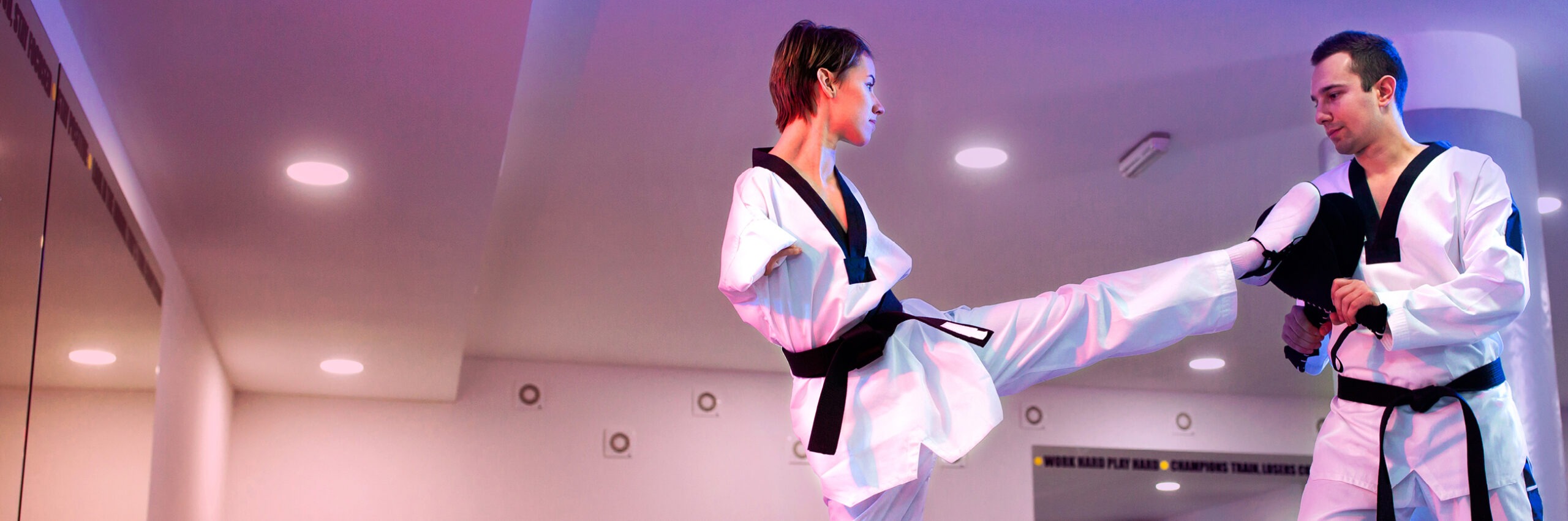 Lady with disability practicing taekwondo